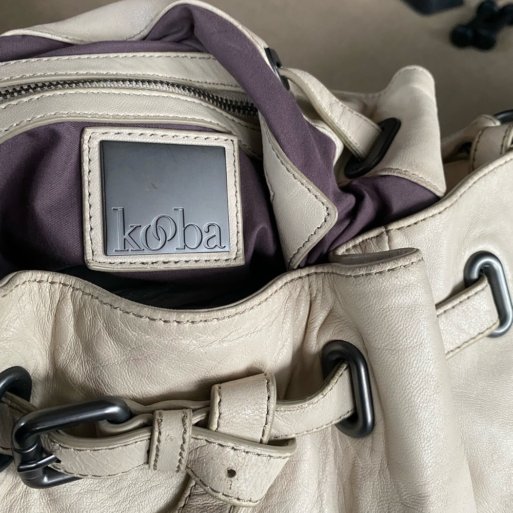 Kooba soft cream color shoulder bag.